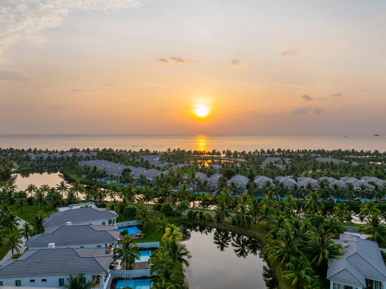 Aerial view of the villas, tropical gardens, and beachfront at Meliá Vinpearl Phu Quoc